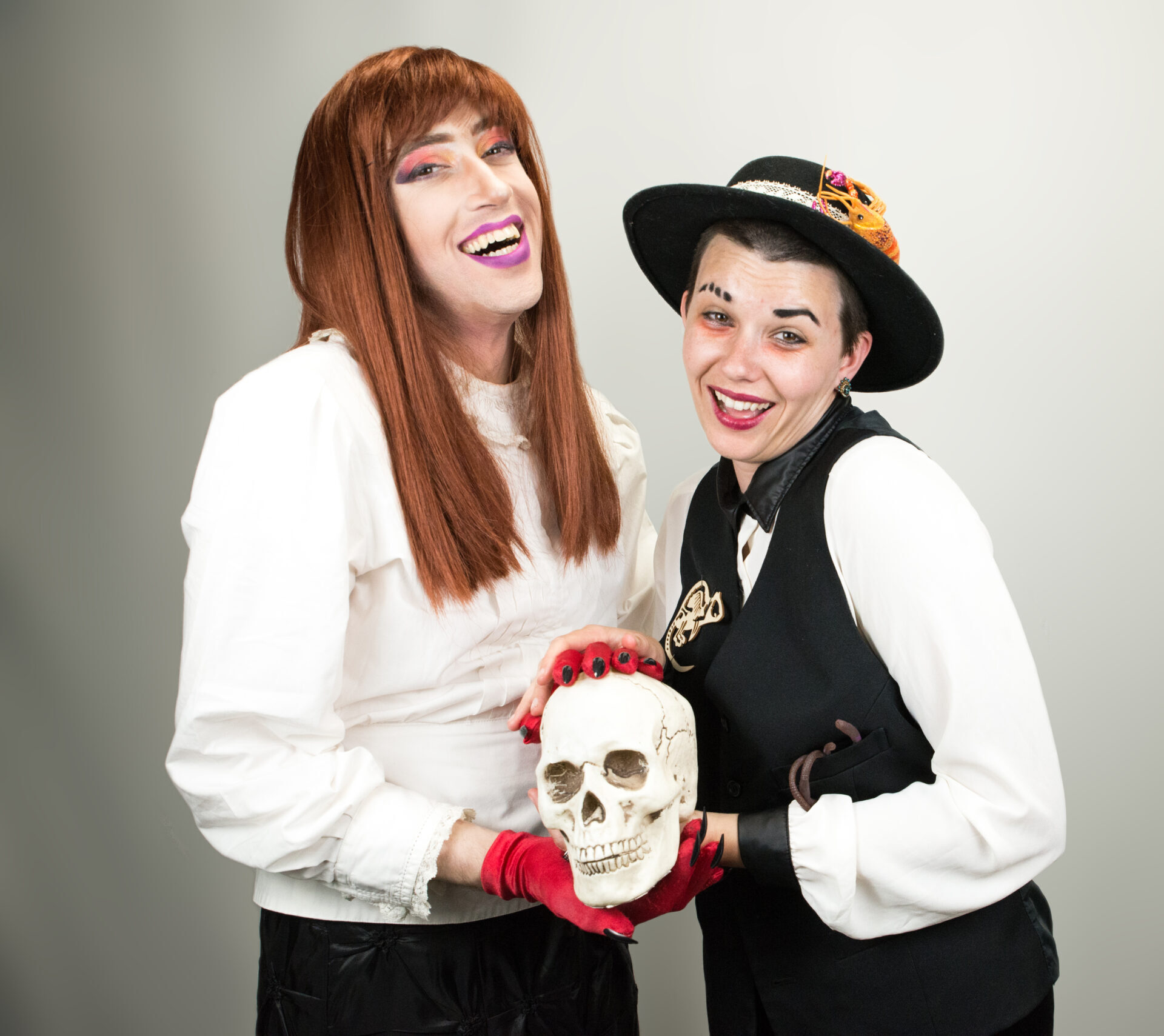 Stage Fright founders Amica and Jeff holding a skull
